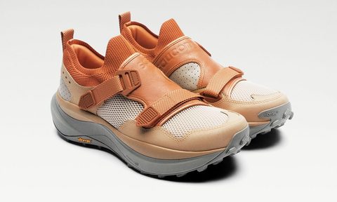 orange and white saucony sneaker