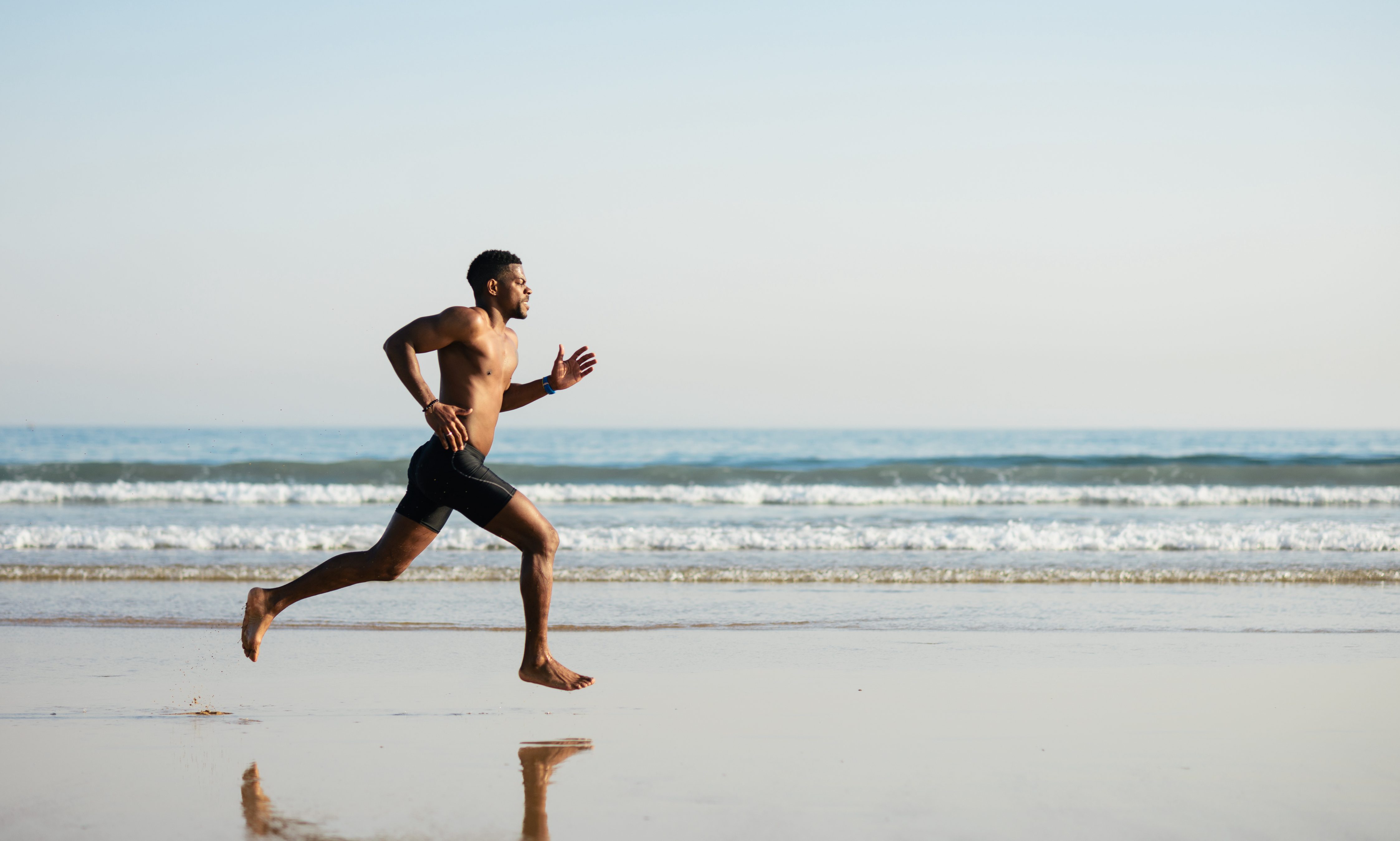Man running on beach
