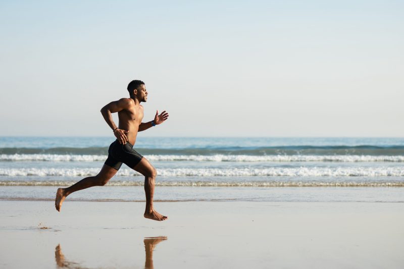 Man running on beach