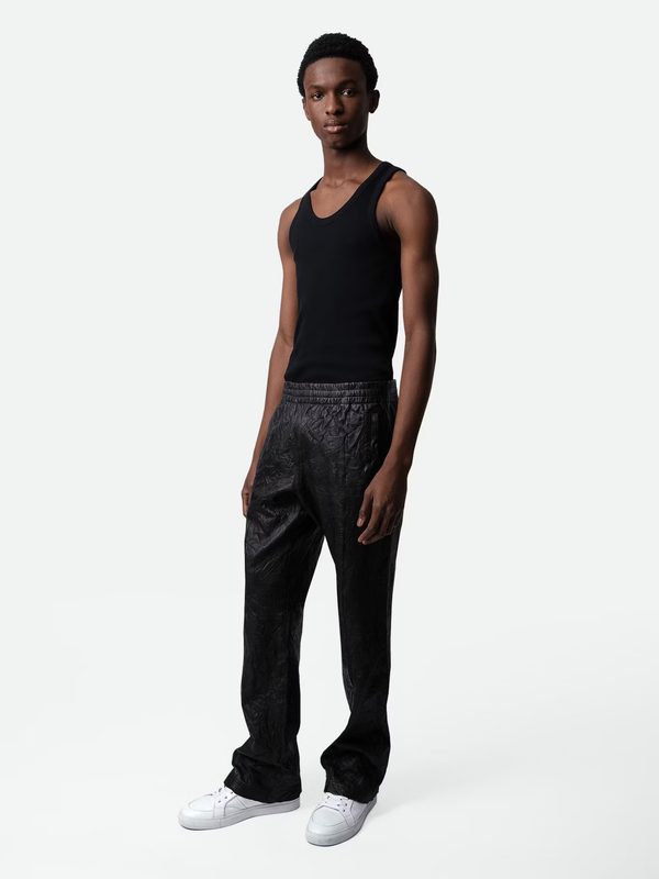 model wearing black leather pants