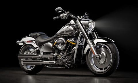 2025 Harley Davidson Fat Boy Gray Ghost right front three quarter view product shot against a black background.