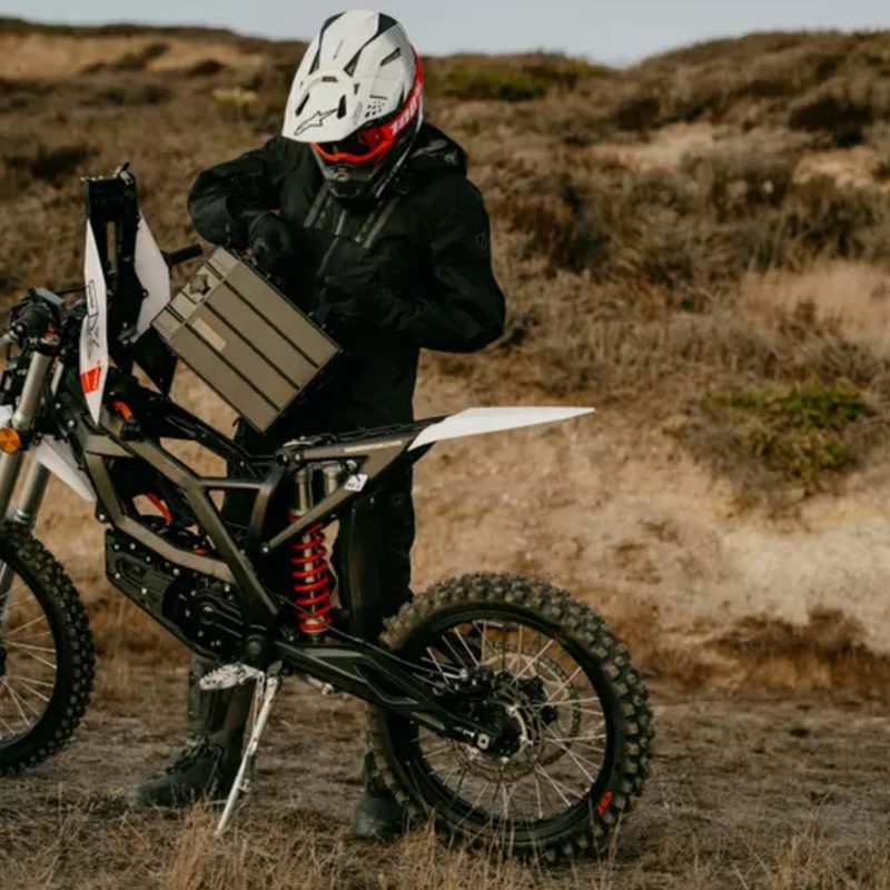 2025 Zero Motorcycles XE with a driver changing the battery.