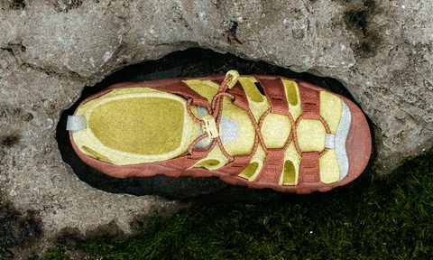 overhead photo of keen sandal on rock