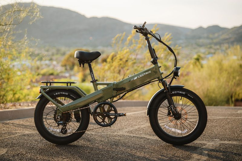 Side profile of Lectric's XP4 folding electric bike, parked on pavement.