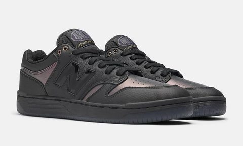 pair of new balance skate shoe sneakers