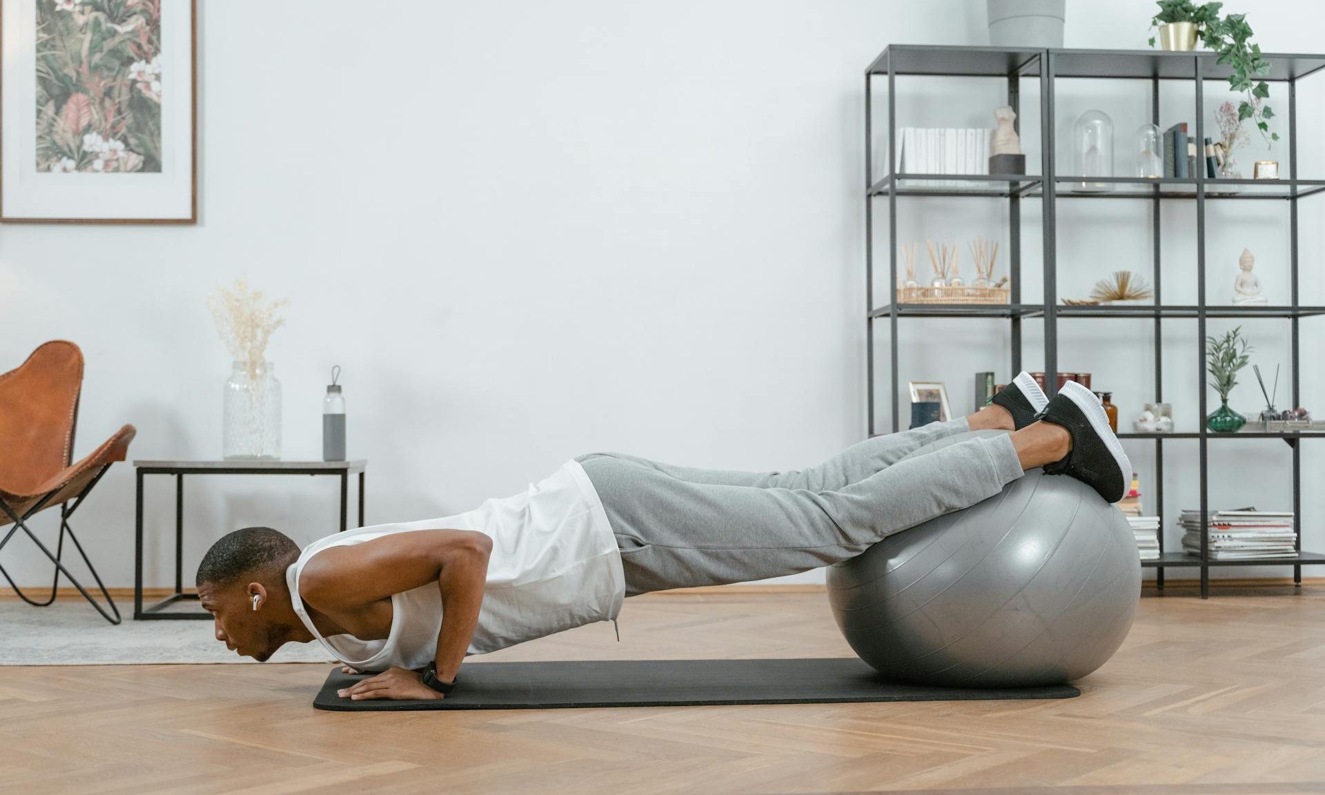 man doing stability ball push up