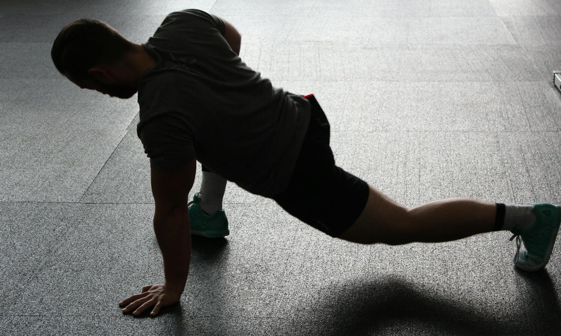 man stretching legs