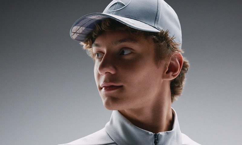 F1 driver Kimi Antonelli wearing Adidas Mercedes racewear.