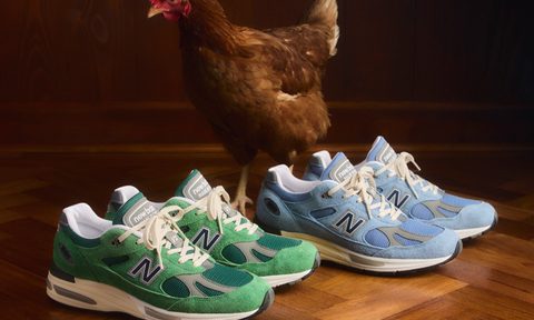 new balance sneakers next to chicken