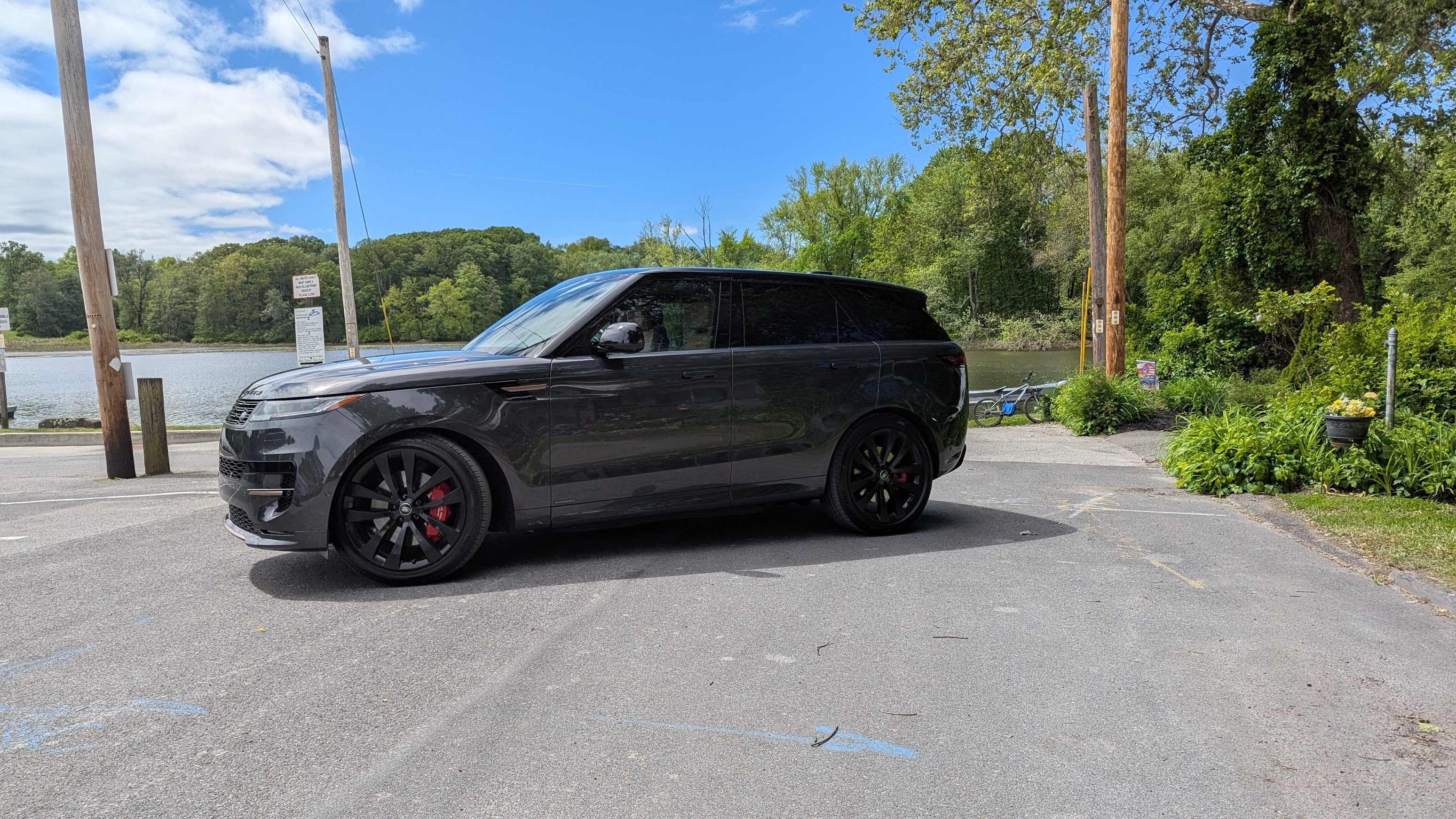 Range Rover Sport PHEV parked close to a river