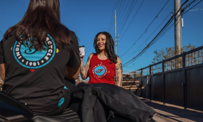 Two people wearing streetwear by Arviso for Indian Motorcycle.