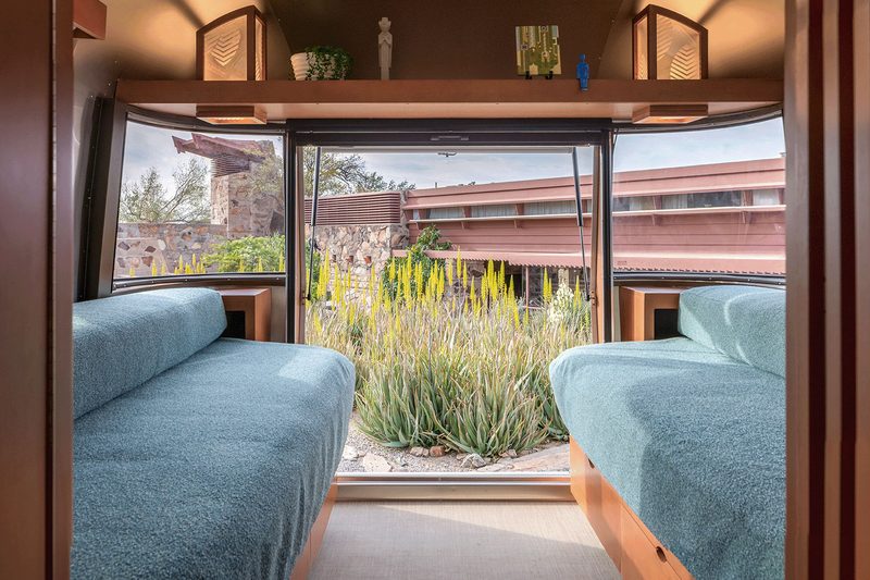 Convertible king bed/lounge inside the Airstream Frank Lloyd Wright Usonian Limited Edition Travel Trailer.