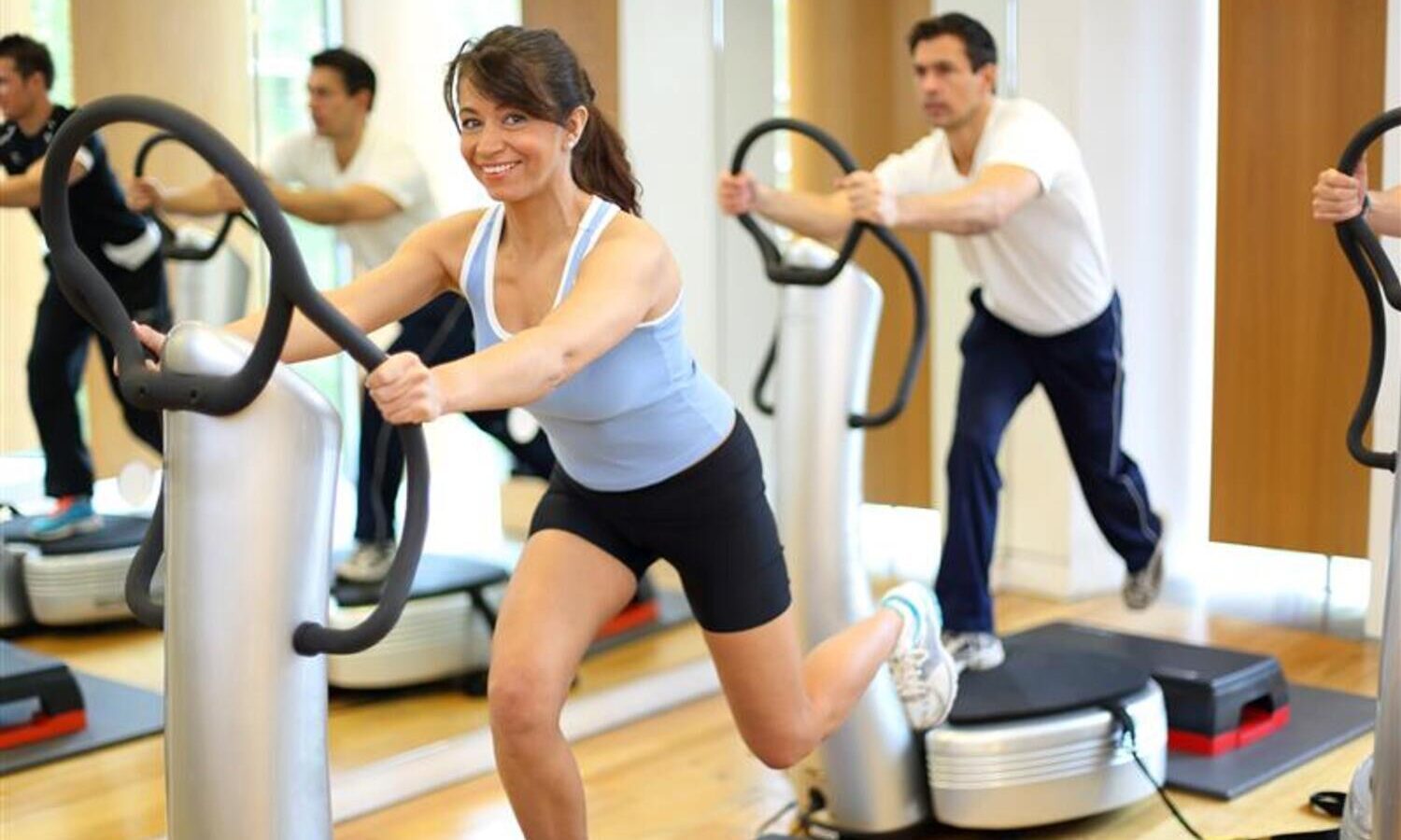 Workout class using vibration plates.