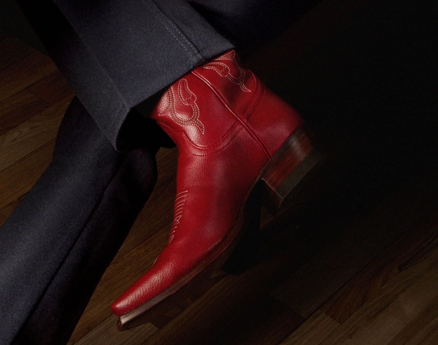 close up on red tecovas boots
