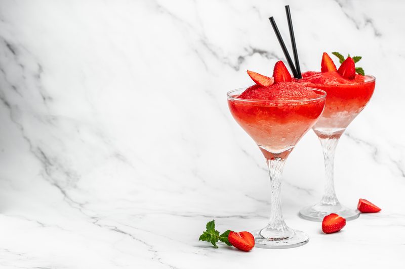 strawberry frose cocktail with pink wine Frose Slushy Smoothy Alcoholic Beverage. Boozy Frozen Rose Frose