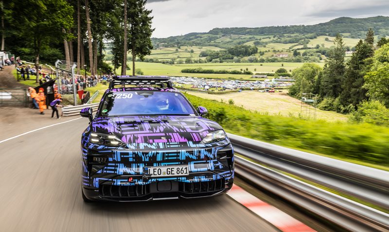 Camoflagued Porsche Cayenne Electric competing at the Shelsley Walsh hill climb direct frontal view.