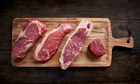 First Light Farms ribeye, ny strip, and filet on cutting board
