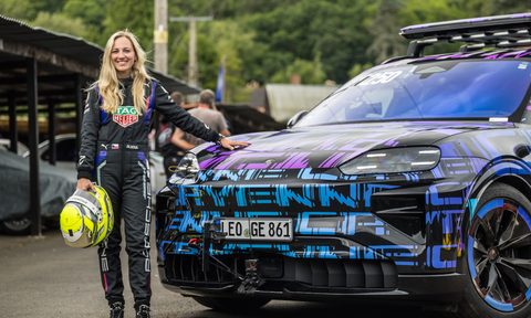 Gabriela Jílková, simulator and development driver for the TAG Heuer Porsche Formula E Team with camoflagued Porsche Cayenne Electric.