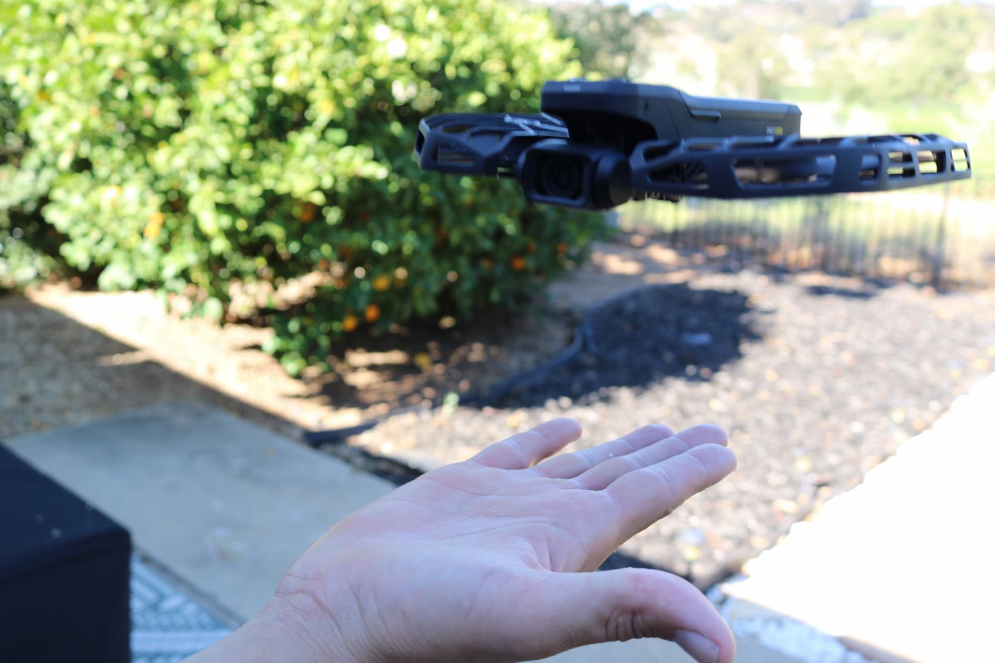 HOVERAir X1 Pro Max hovering above hand