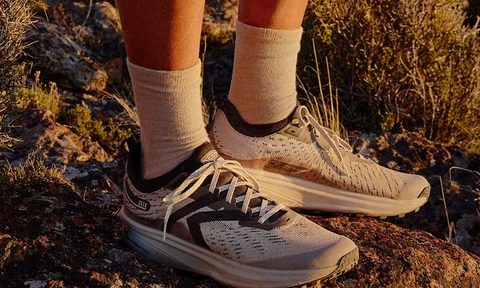 man wearing keen sneaker in dirt