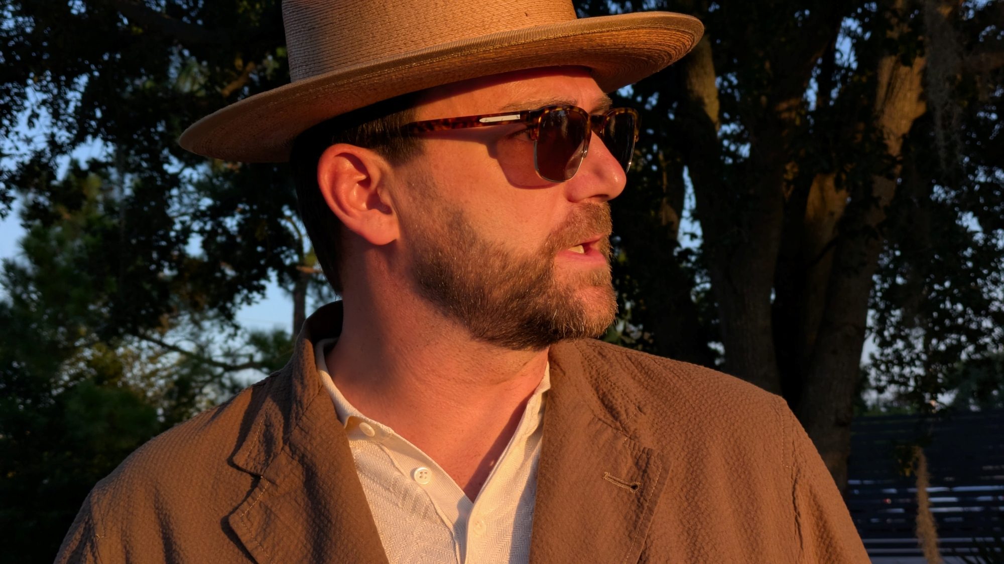 Man in Buck Mason Carry-On Suit and hat