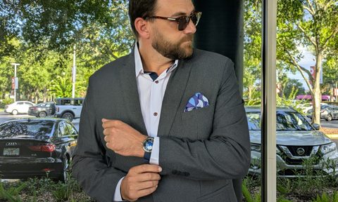Man in Twillory suit adjusting his cuff