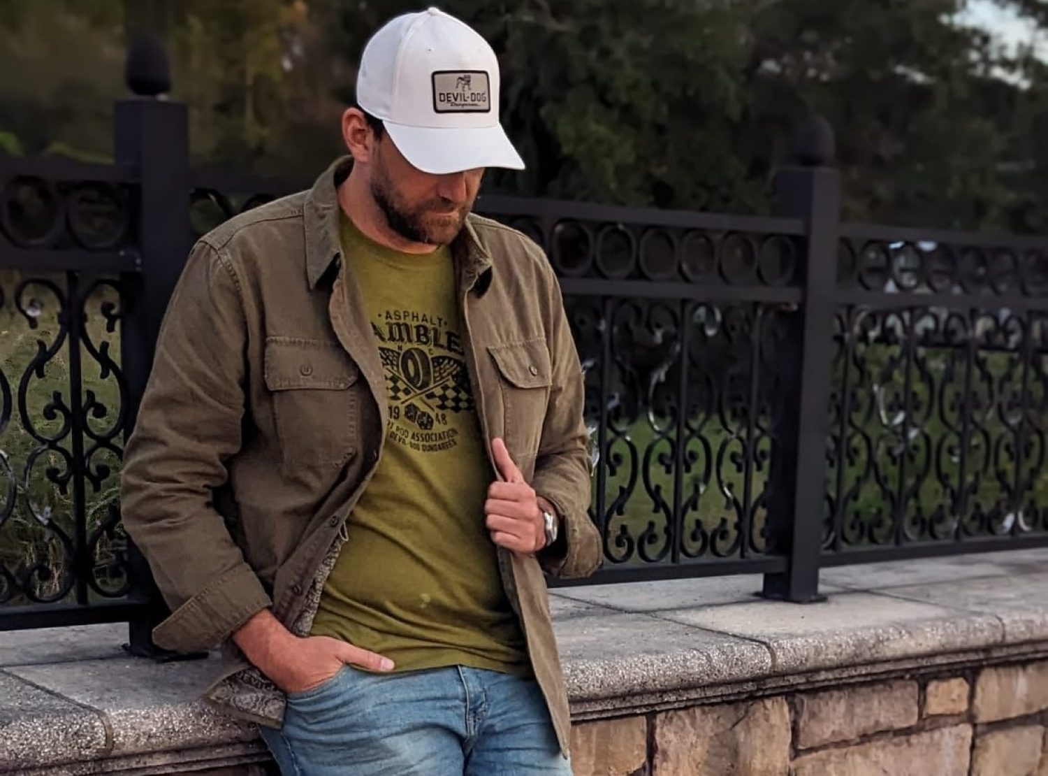 Man leaning on bridge