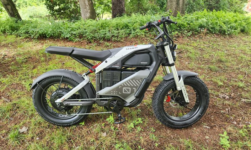 Segway Xyber e-bike right side parked on a grassy hill.