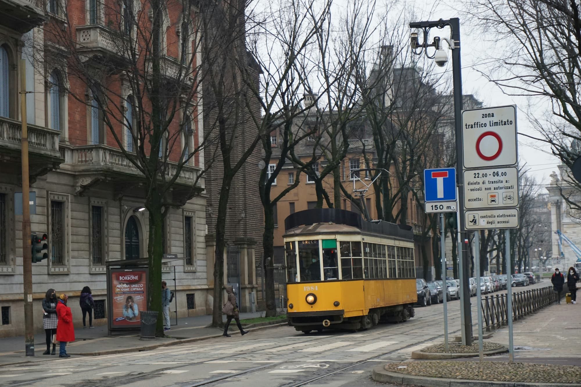yellow and white tram on road during day