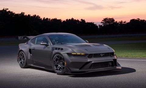 2025 Mustang GTD Liquid Carbon parked on a racetrack right front three-quarter view.