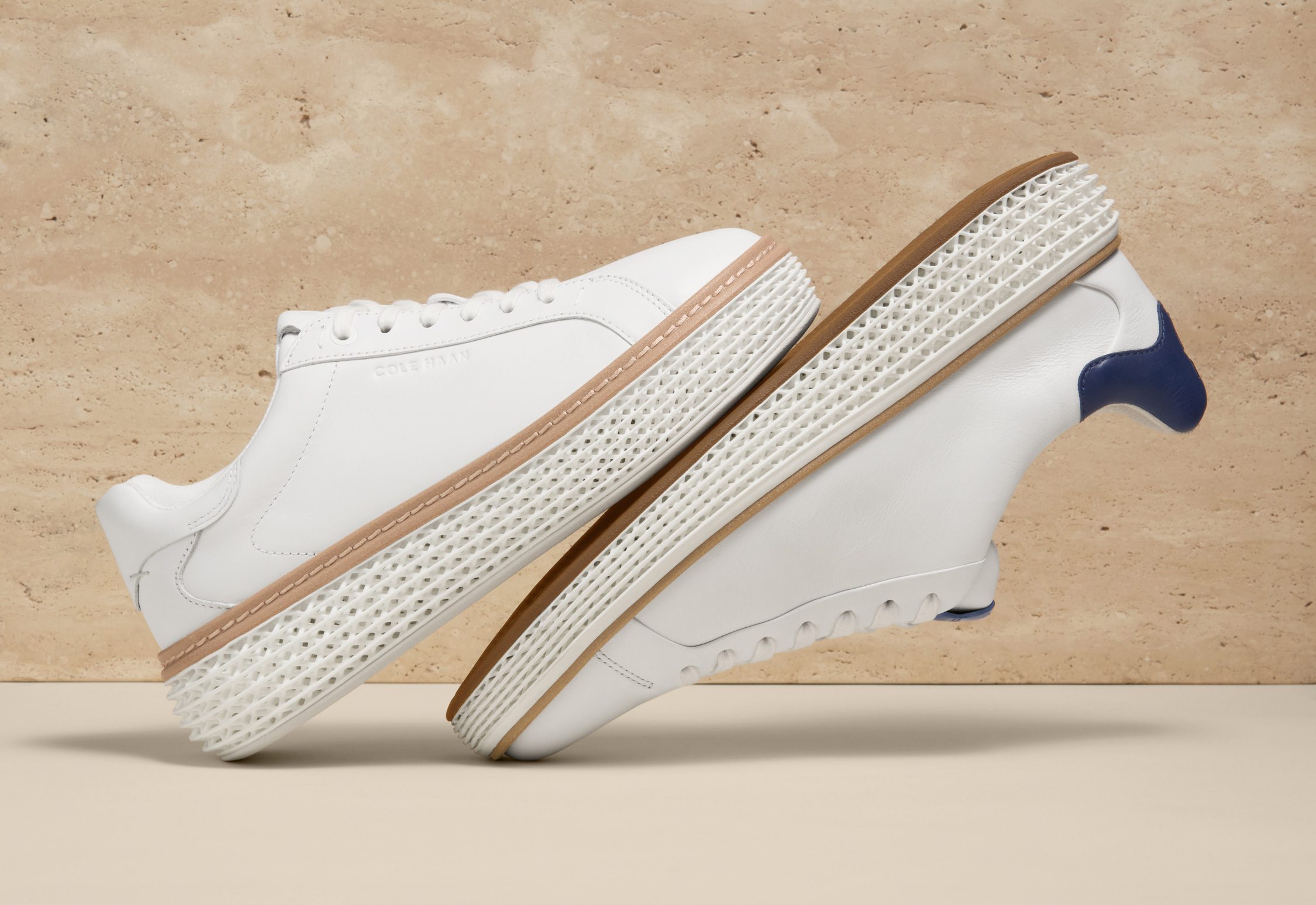 white cole haan grand pro court sneakers