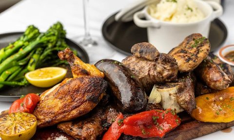 parrillada of meat with veg and mashed potato