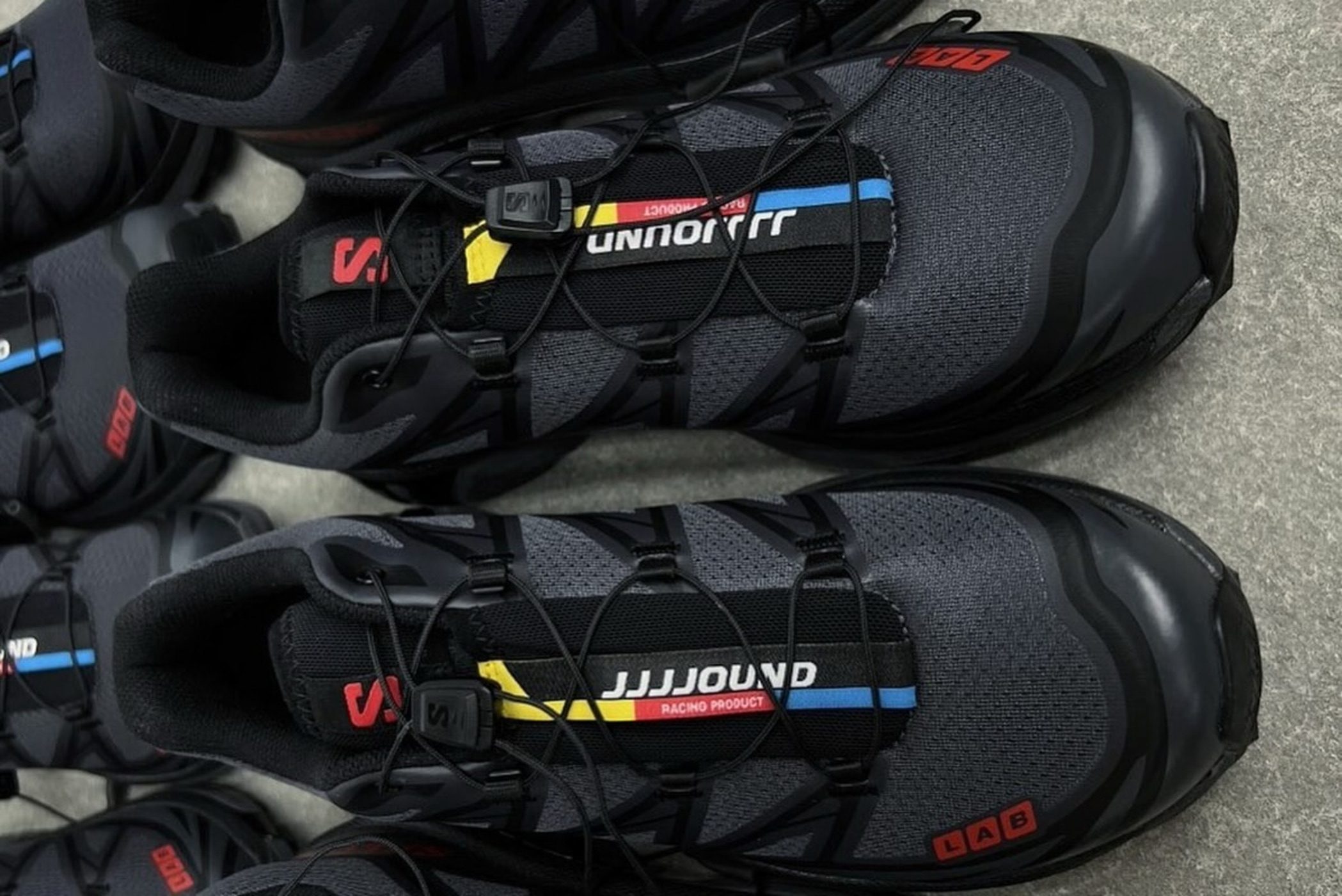 black jjjjound and salomon sneakers