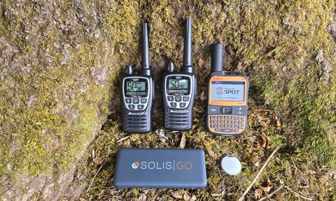 Off grid communication devices lined up outdoors