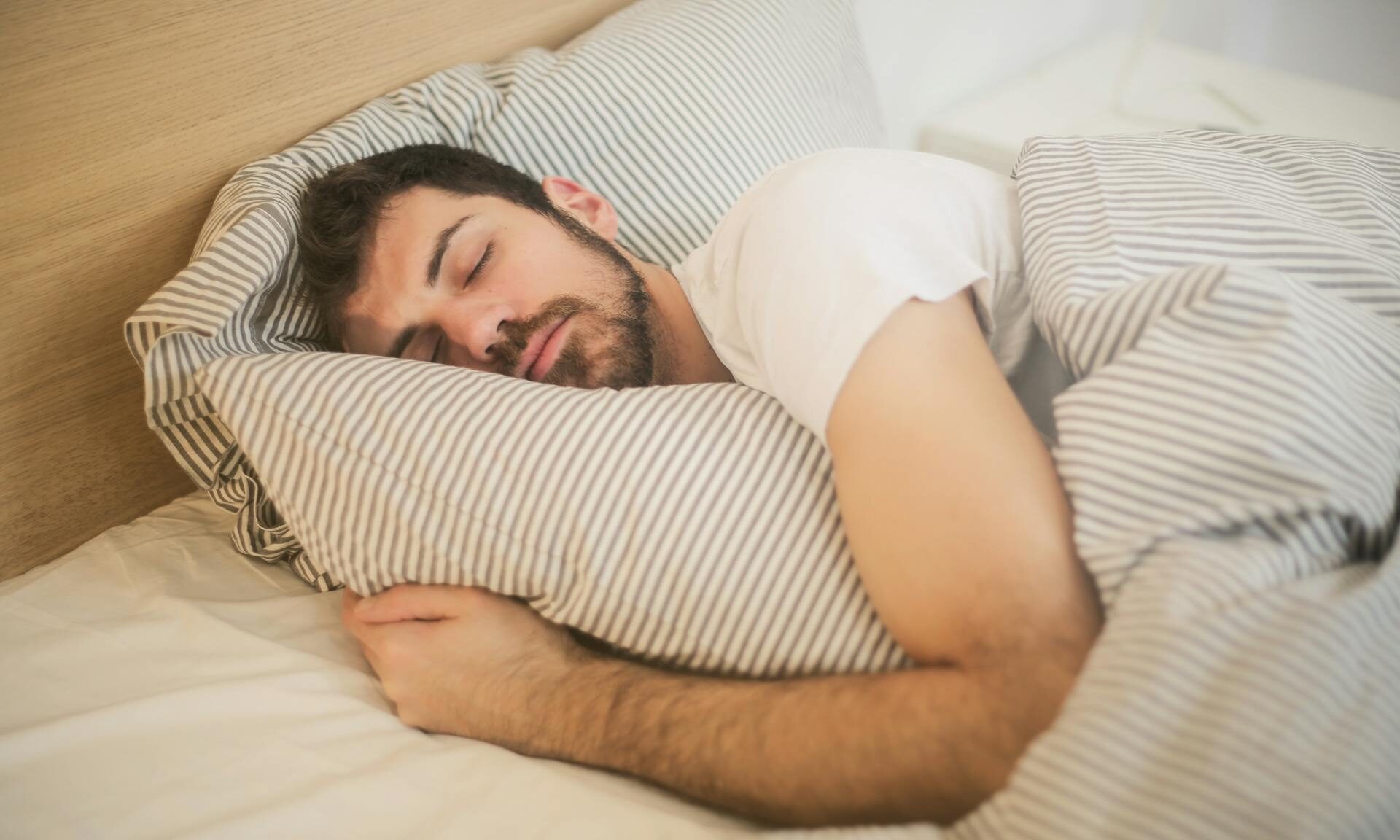 a man sleeping on his side