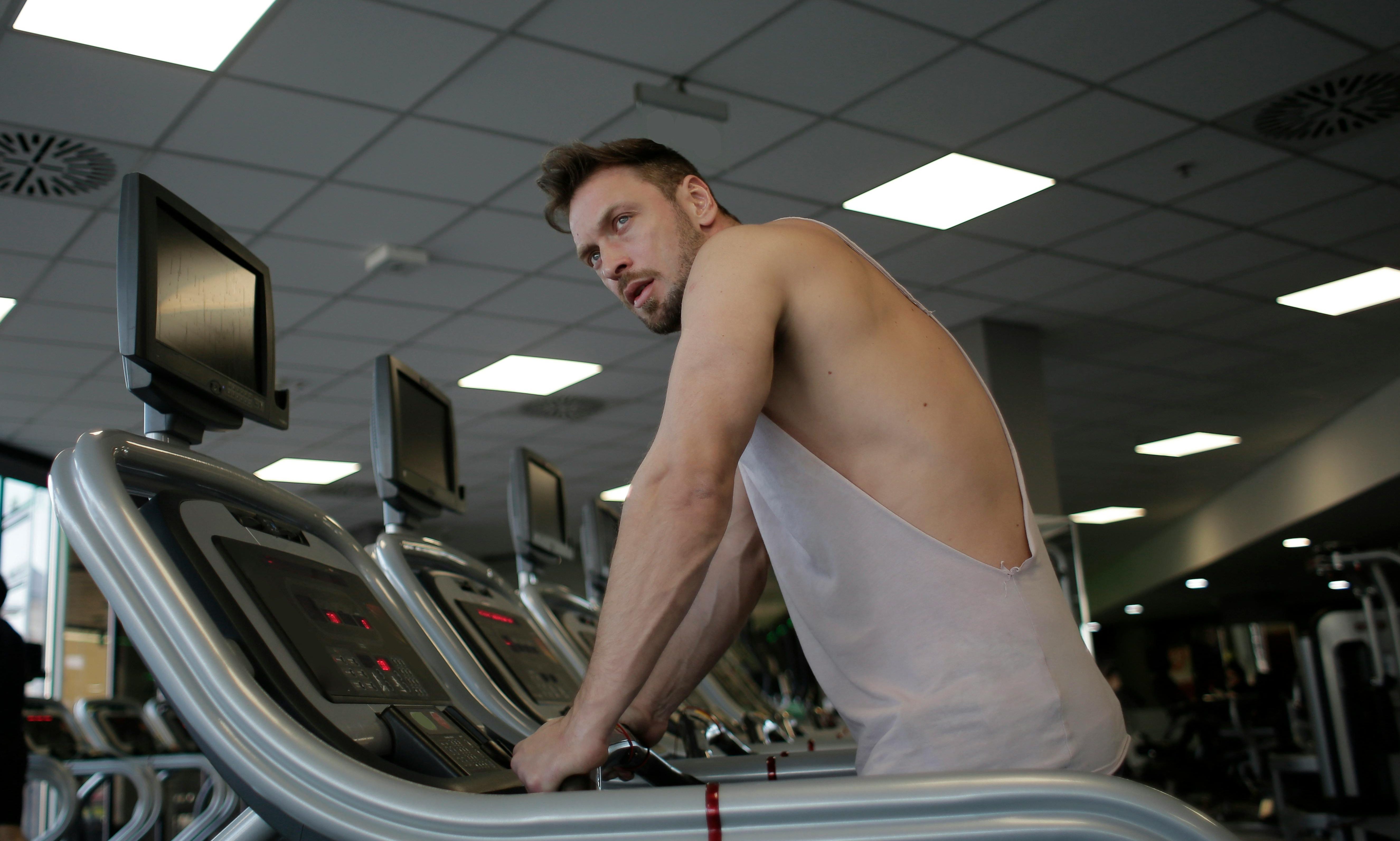 Man on treadmill.