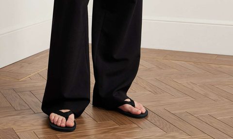 man wearing the row sandal