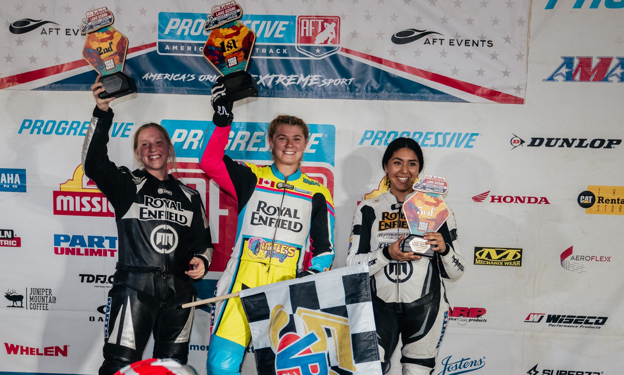 Royal Enfield BTR Ozark flat track winners Emma Gottsch, Taia Little, and Madicela Rodriquez.