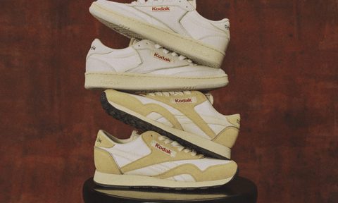 pairs of reebok x kodak on stool