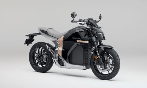 Honda WN7 electric motorcycle with gold accents.