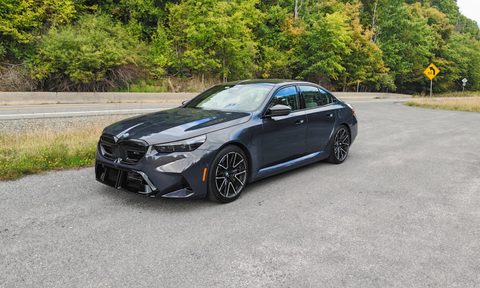 Front 3/4 view of a a 2025 BMW M5