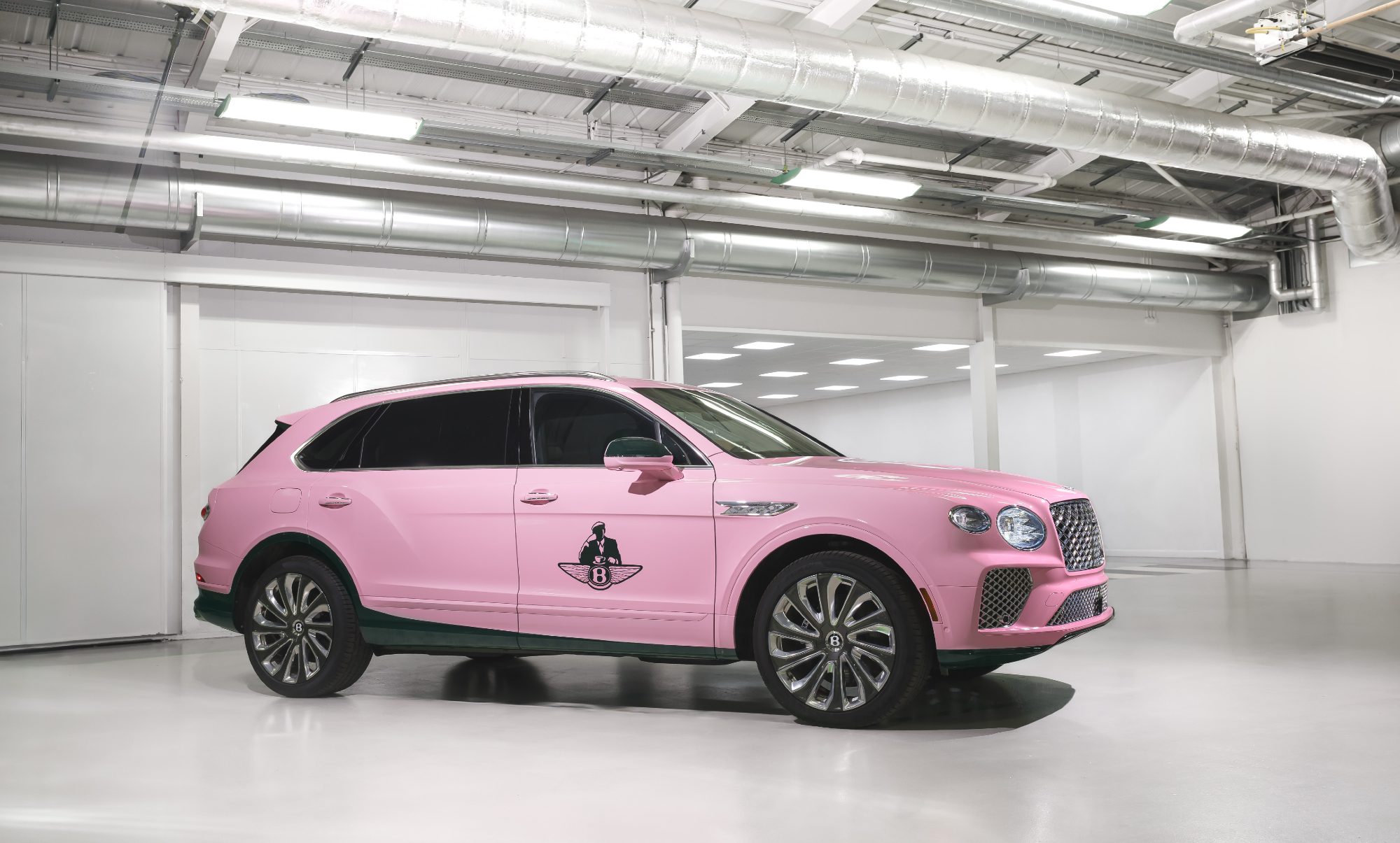 Pink Bentayga for the Bentley x and The Juice collab right side view.