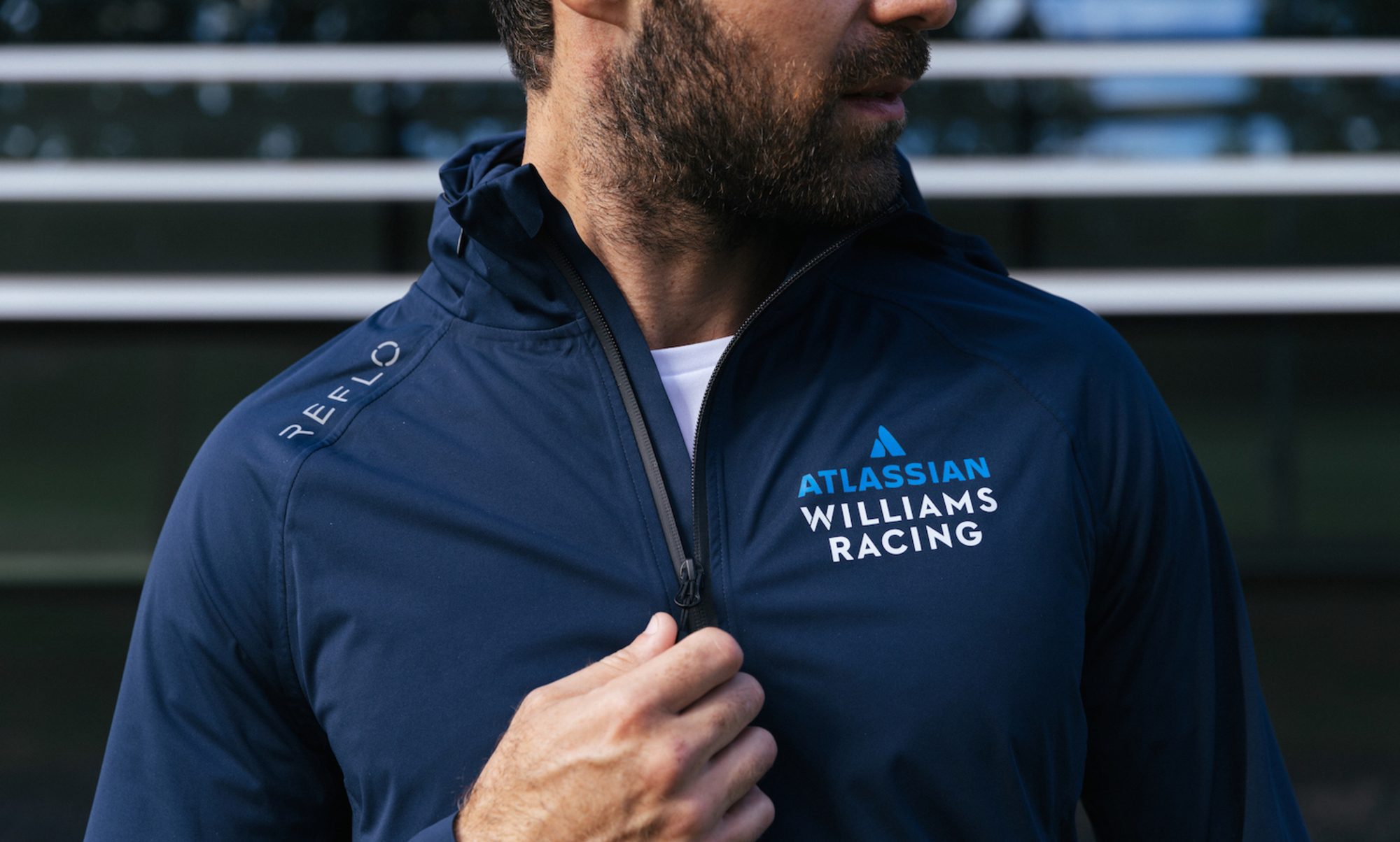 Reflo Atlassian Willams Racing unisex travel quarter zip in blue.