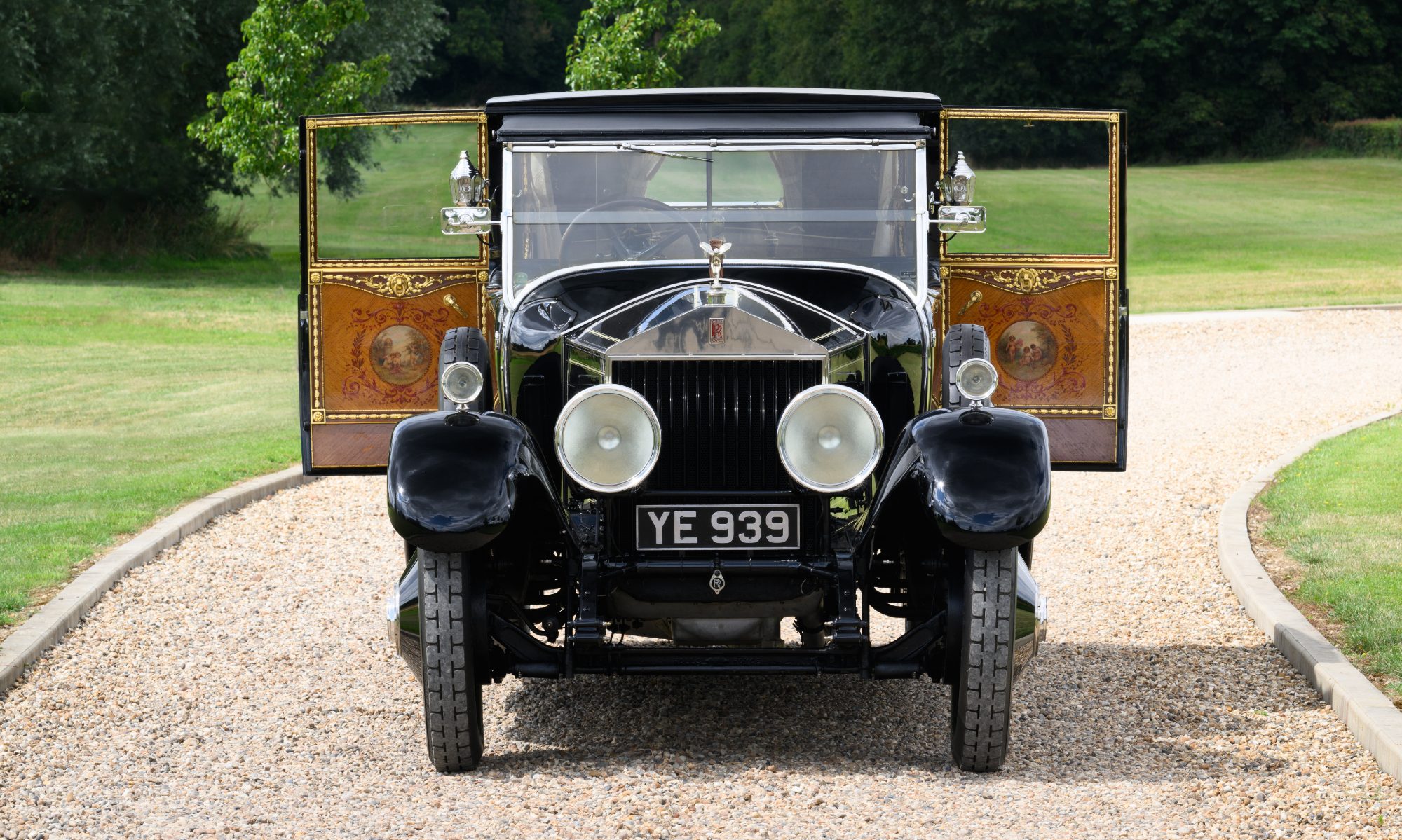 The Phantom of Love Rolls Royce front view with open doors at Hampton Gardens.