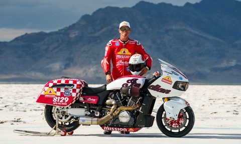 Tyler O'Hara standing next to S&S-built Indian Challenger on Bonneville Salt Flats.