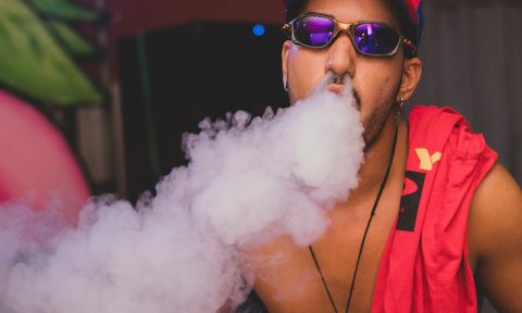 man with smoke coming out of his nostrils