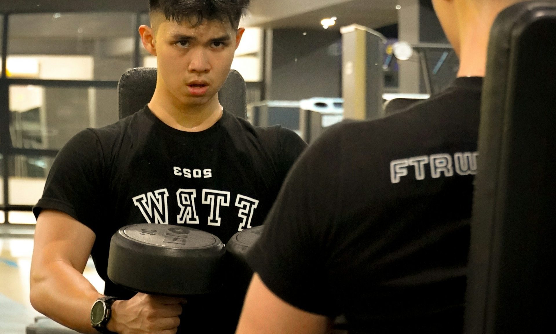 kids teen lifting weight dumbbell