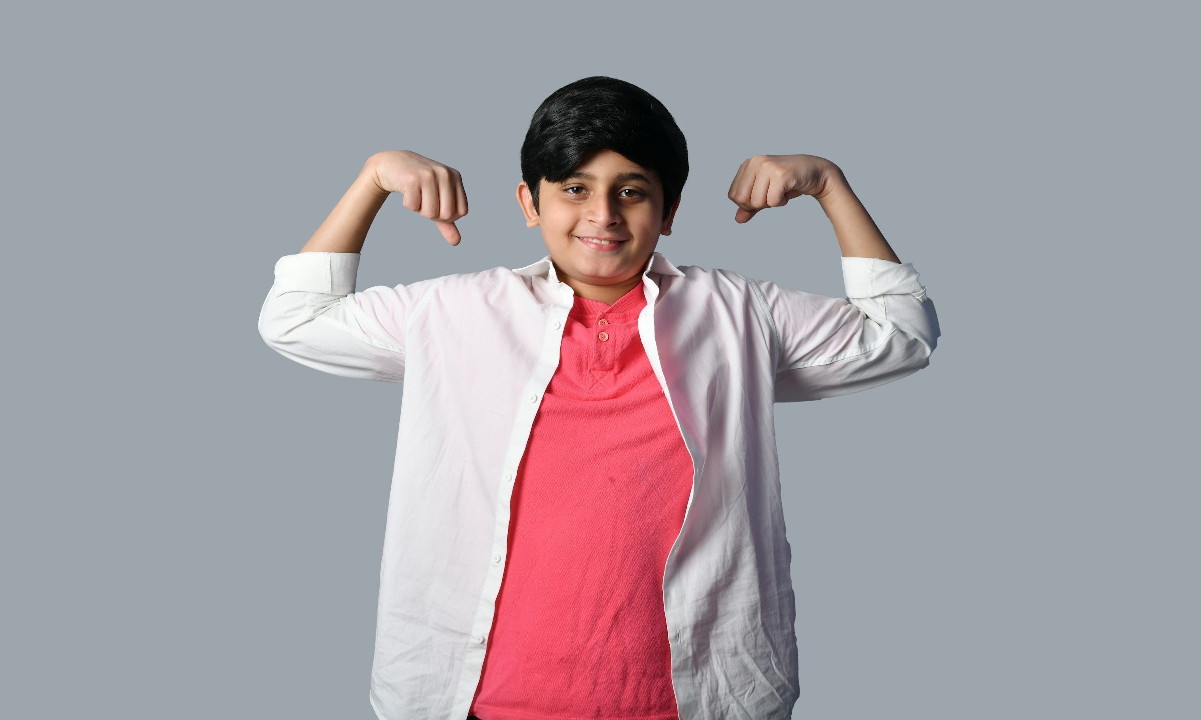 kid flexing muscles