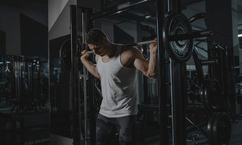 Man barbell gym