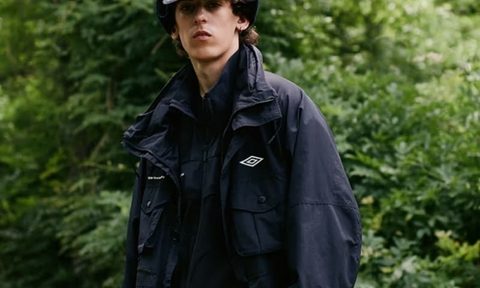 man wearing all black white mountaineering umbro
